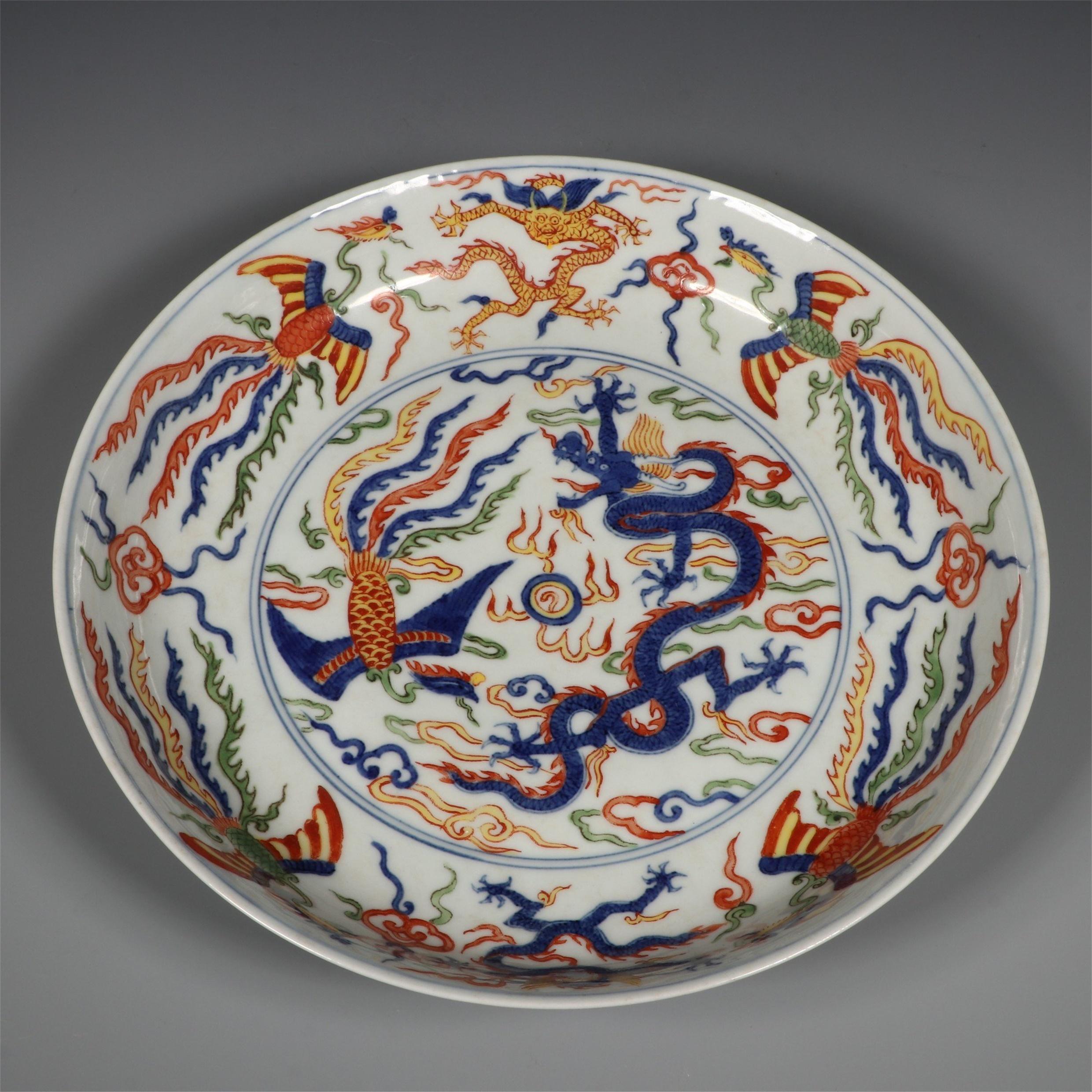 Porcelain Plate Decorated with Colorful Dragons and Phoenix Patterns Produced During the Reign of Wanli Emperor  Palace Museum